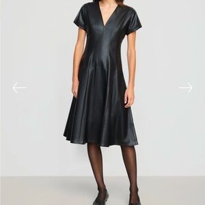 Black midi A-line dress with flutter sleeves and a v-neck for cocktail occasions